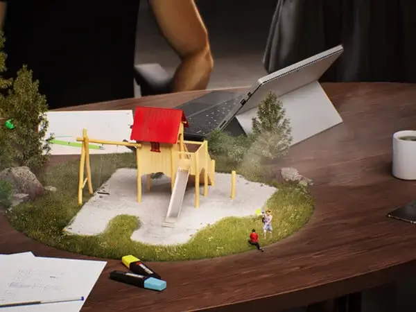Beispielbild für die Leistung: Spielplatz-Konzepterstellung - Auf einem Schreibtisch: Stifte, Papier, Kaffetassen und ein aufgeklappter Laptop. In der Mitte des Tischs eine Art Diorama: Auf einer runden Rasen-Grundfläche steht ein Spielhaus mit angebauter Schaukel, Rutsche und Reckstange und Kinder spielen außenherum.
